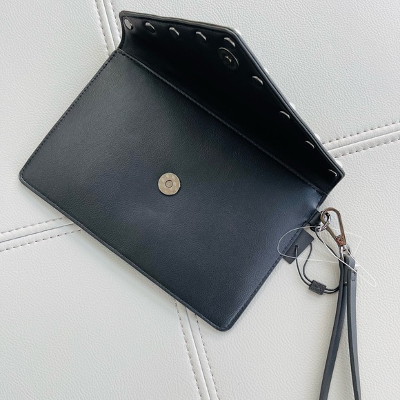 New With Tags
BCBG Pearl + Leather Inspired
Envelope Clutch in
BLACK - Picture 12 of 15